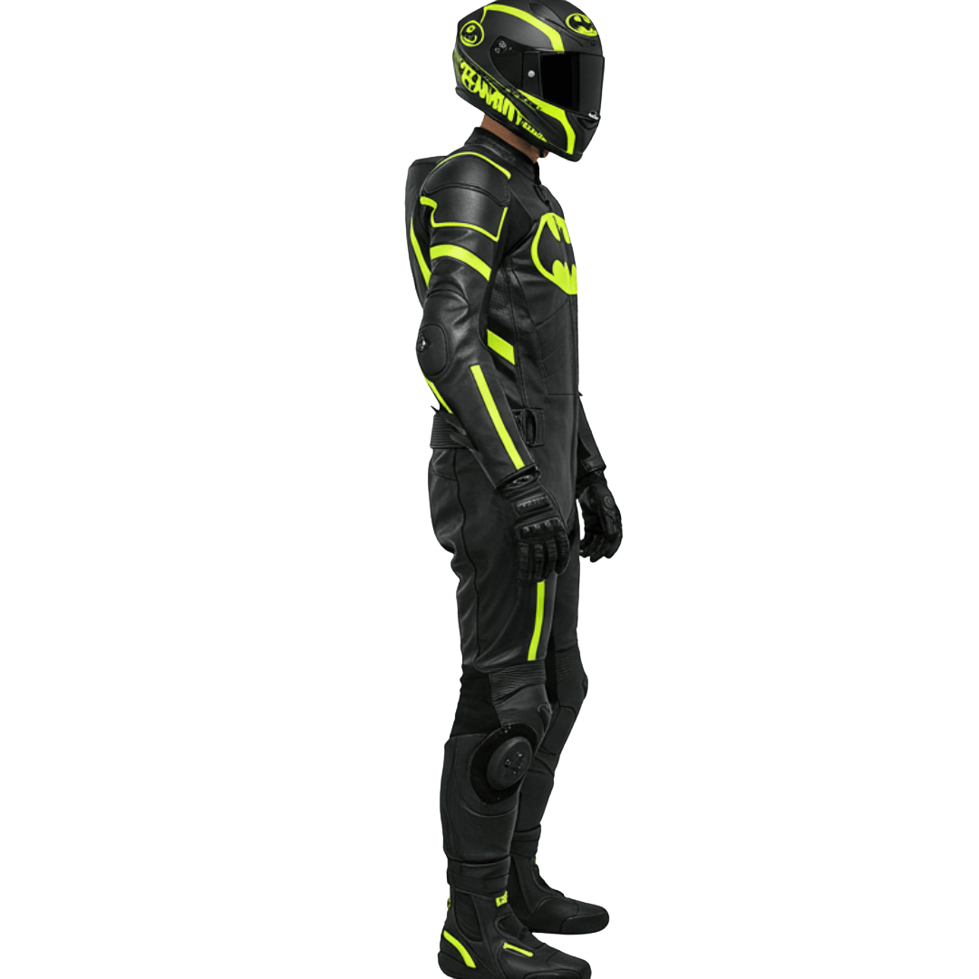 Person wearing a black and yellow motorcycle suit and helmet on a white background