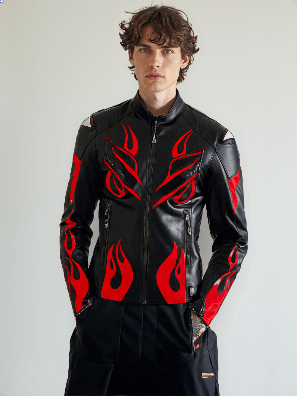 Stylish motorcycle jacket with flame graphics and durable riding protection.