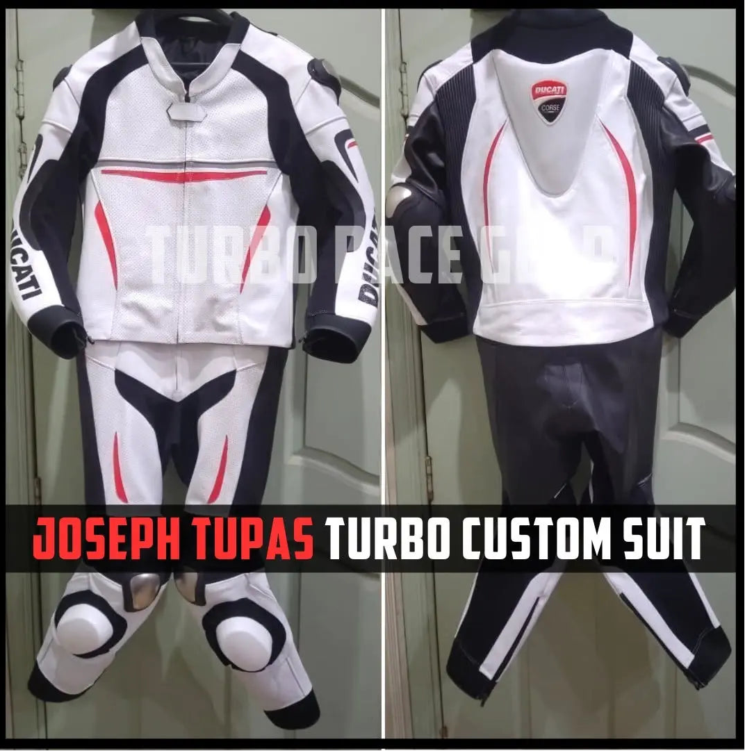 A custom motorcycle racing suit shown from both front and back views, featuring a white base with black panels and red graphic accents. The suit includes a jacket, pants, and knee pads.