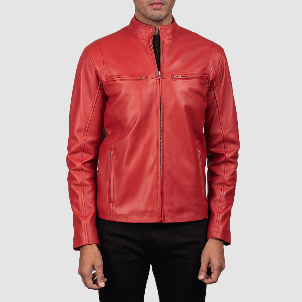 A man wearing a red leather motorcycle jacket with black accents and orange stripes on the chest, arms, and back. He has a buttoned collar and the jacket has a zipper down the front.