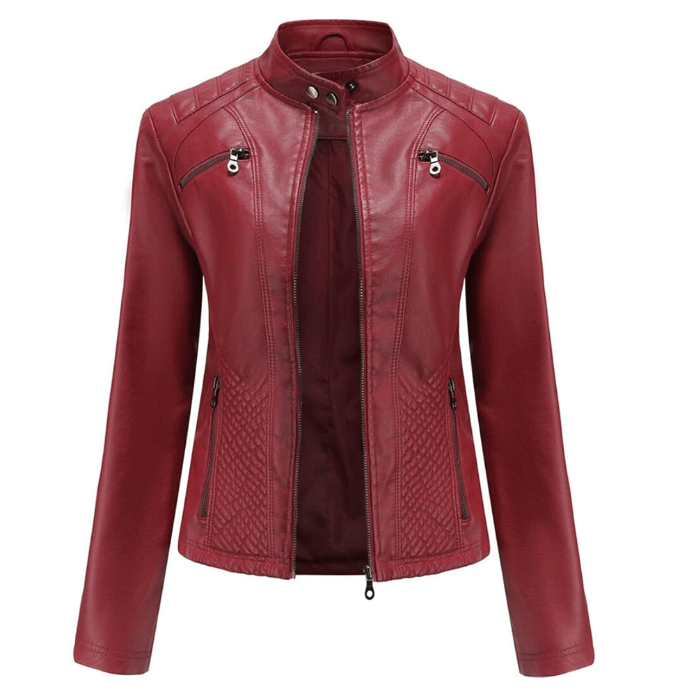 A red leather motorcycle jacket with a mandarin collar, zipper details, and quilted design on the chest.