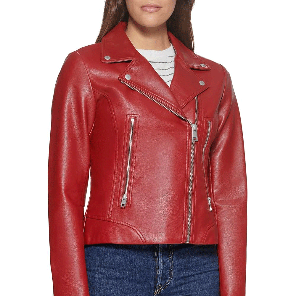 A woman wearing a red leather motorcycle jacket with a mandarin collar and zipper details.